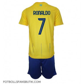 Al-Nassr Cristiano Ronaldo #7 Replika Hemmatröja Barn 2023-24 Kortärmad (+ Korta byxor)